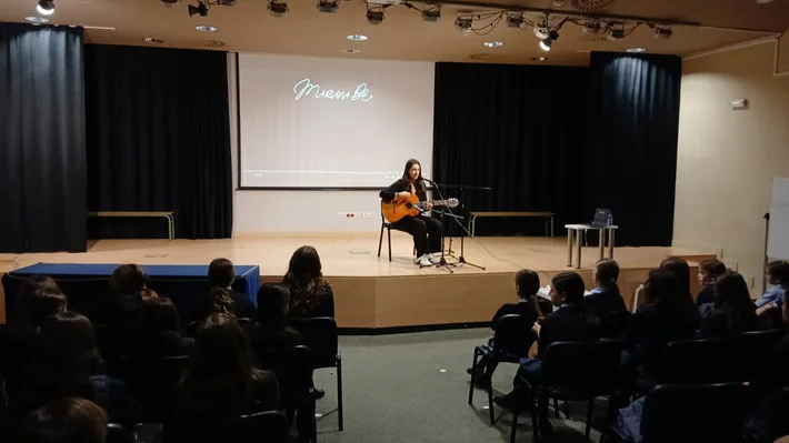 Songs and stories in an auditorium