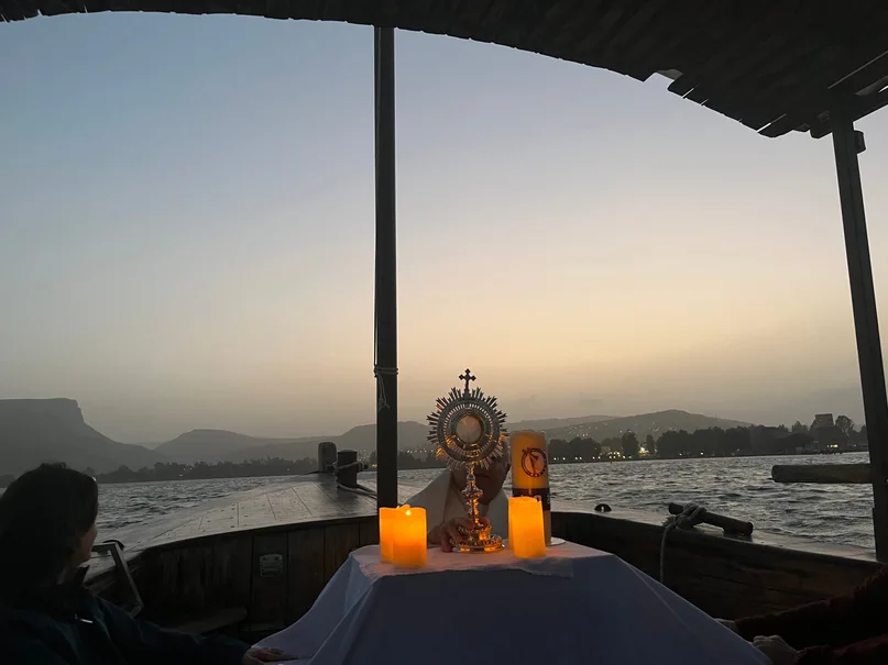Prayer overlooking the water